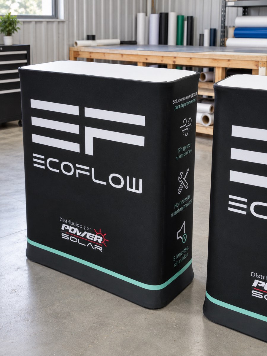 EcoFlow branded square fabric exhibition counter, logo and side view in a digitally staged workshop