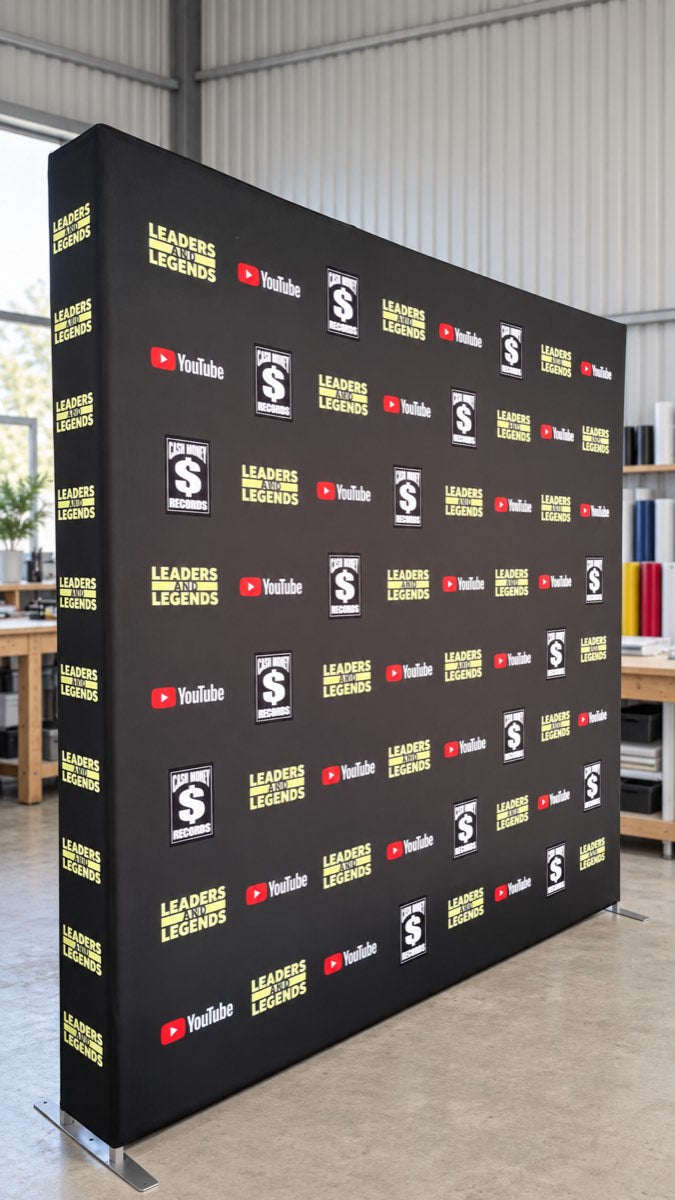 Retail Sign straight pop-up display wall with media backdrop, featuring leaders and legends design for trade shows or events.