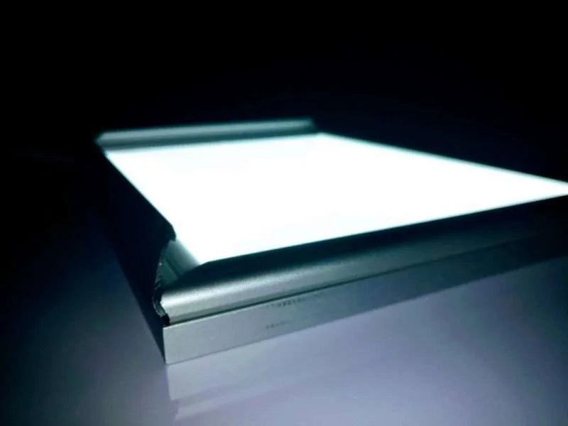 Backlit LED lightbox frame by Retail Sign displaying a poster for retail or commercial use, illuminated for visibility.