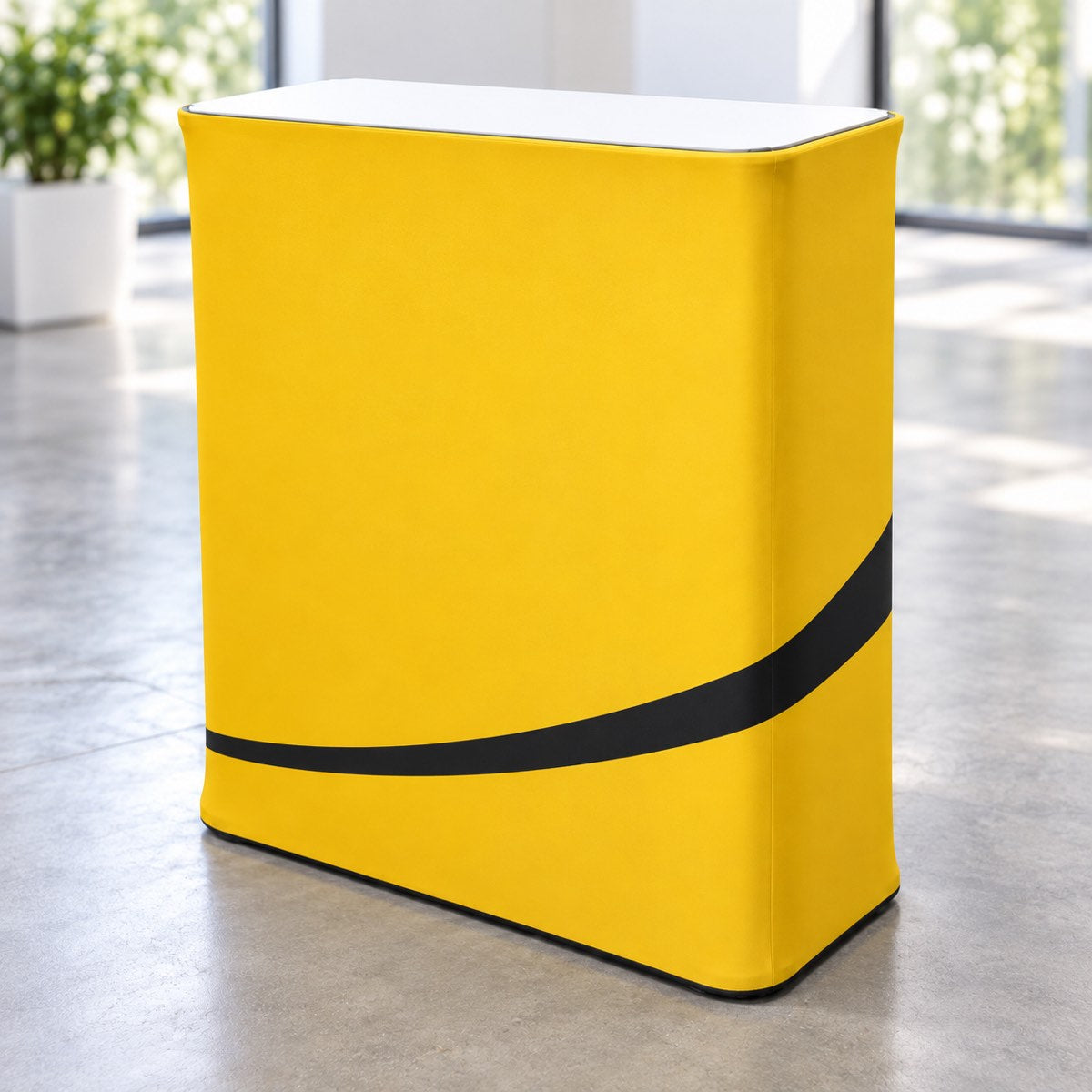 Square fabric exhibition counter with white tabletop and yellow printed wrap — illustrative mockup