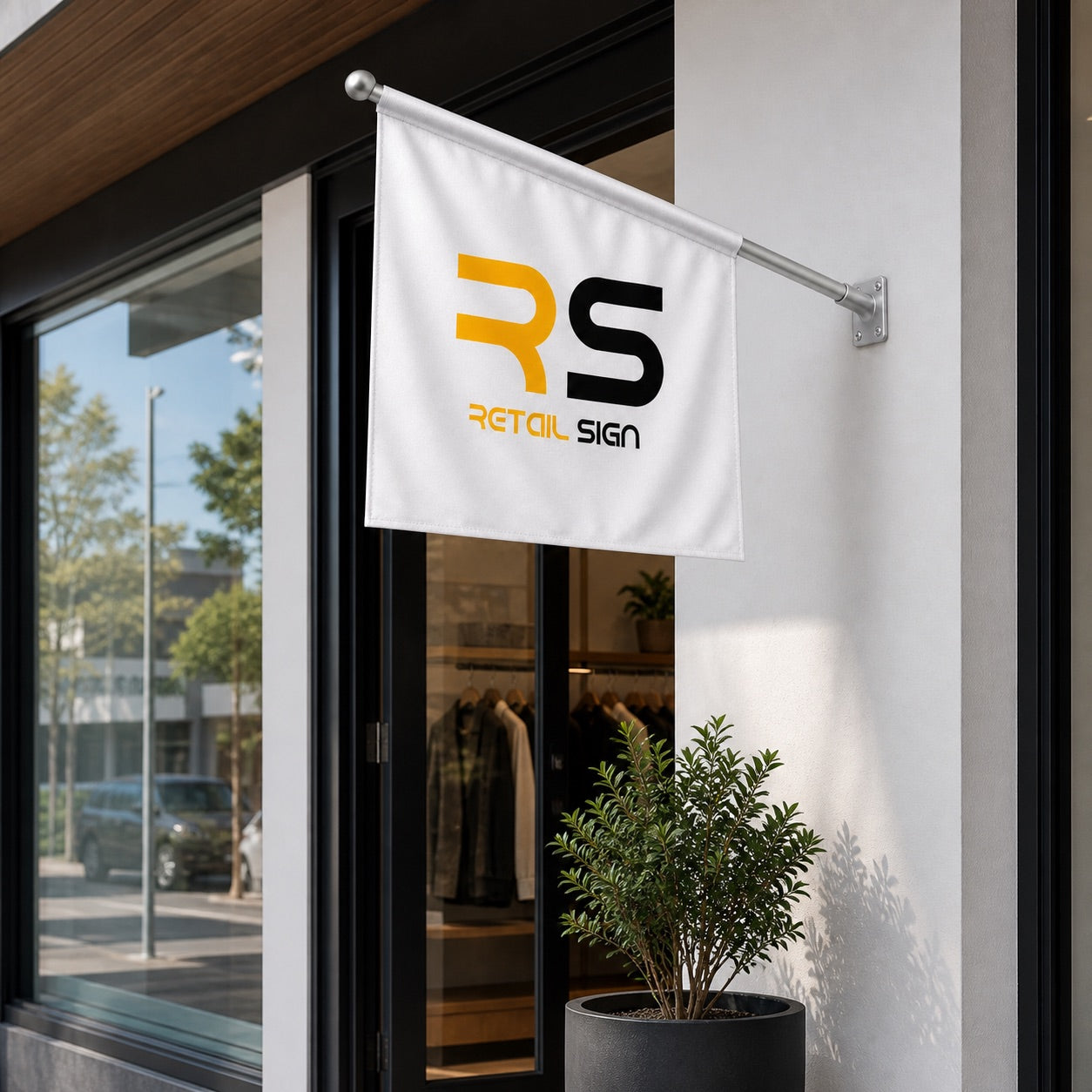 Custom wall mounted flag installed outside a shop